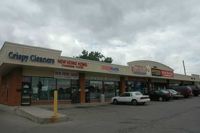 Modern interior with three tables and chairs