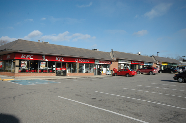 Modern interior with three tables and chairs
